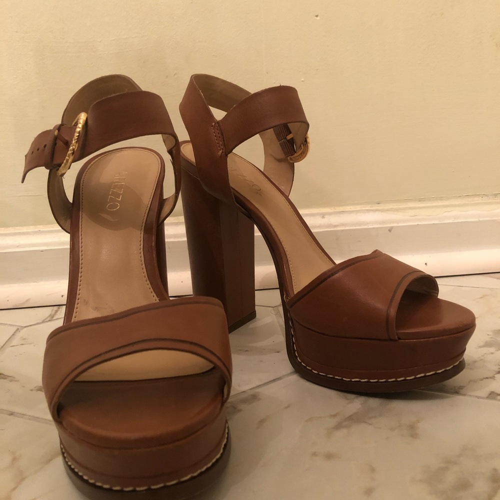 Tan 5in heels. Worn only once.